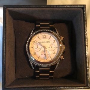 Michael Kors rose gold watch with rhinestone face